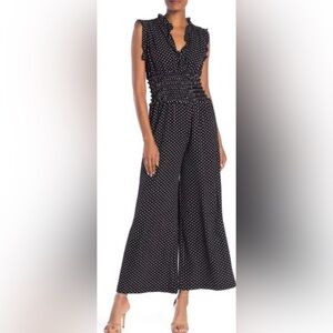 Black jumpsuit with colorful patterns